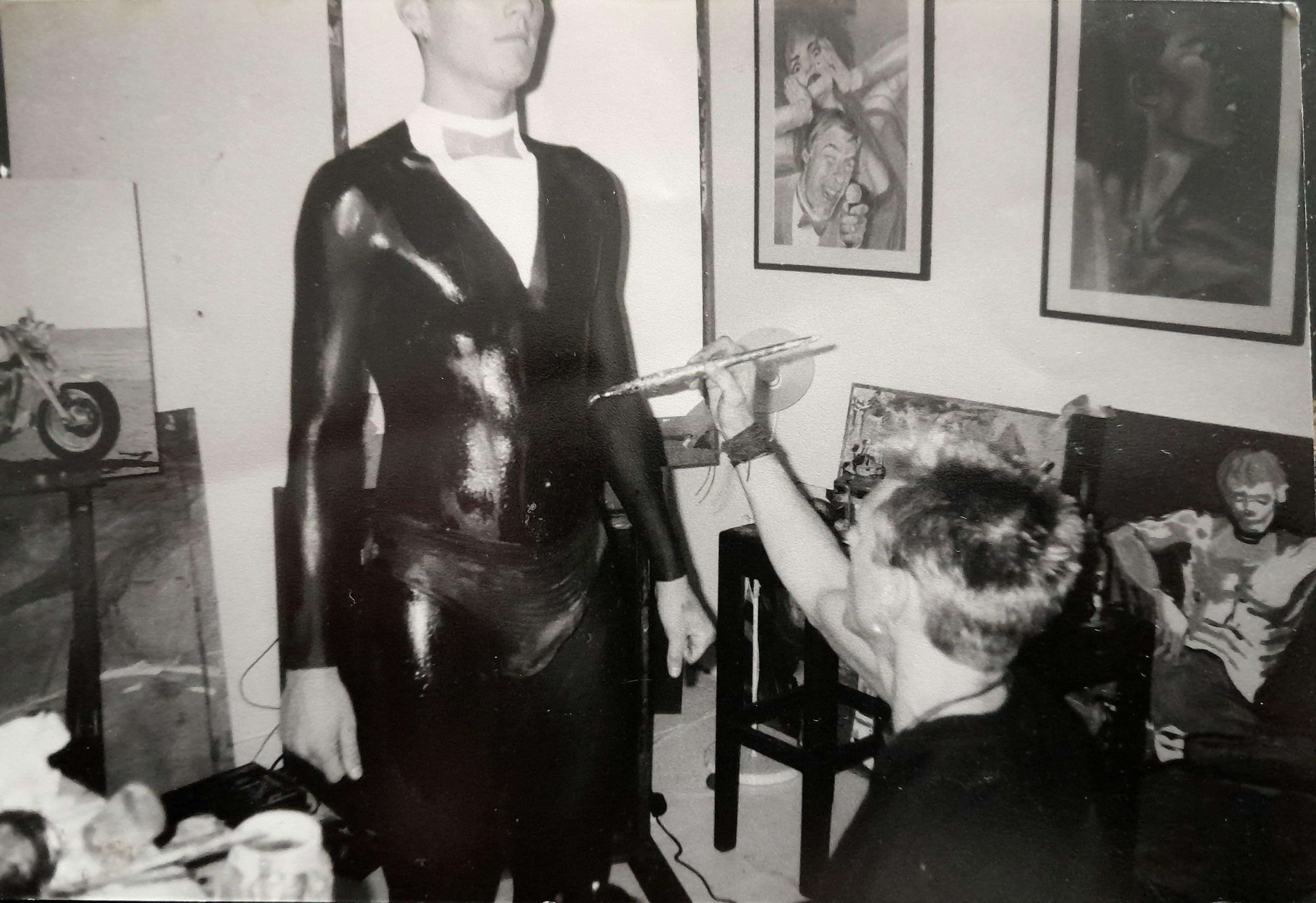 model in body-painted tuxedo